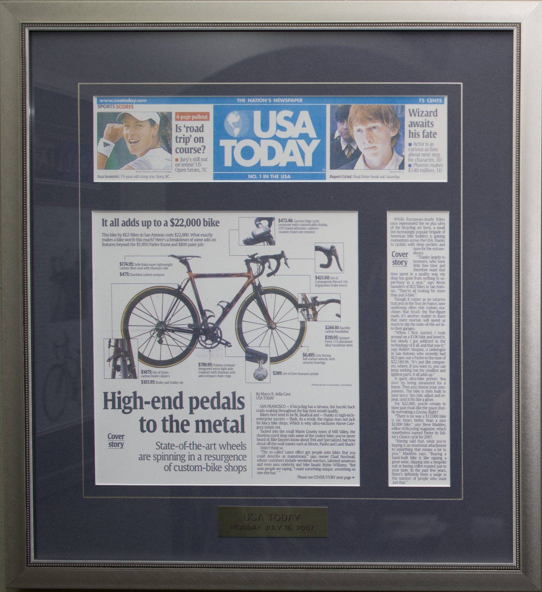 A framed USA Today newspaper article from July 16, 2007, featuring a KGS custom bicycle designed by Kevin G. Saunders.