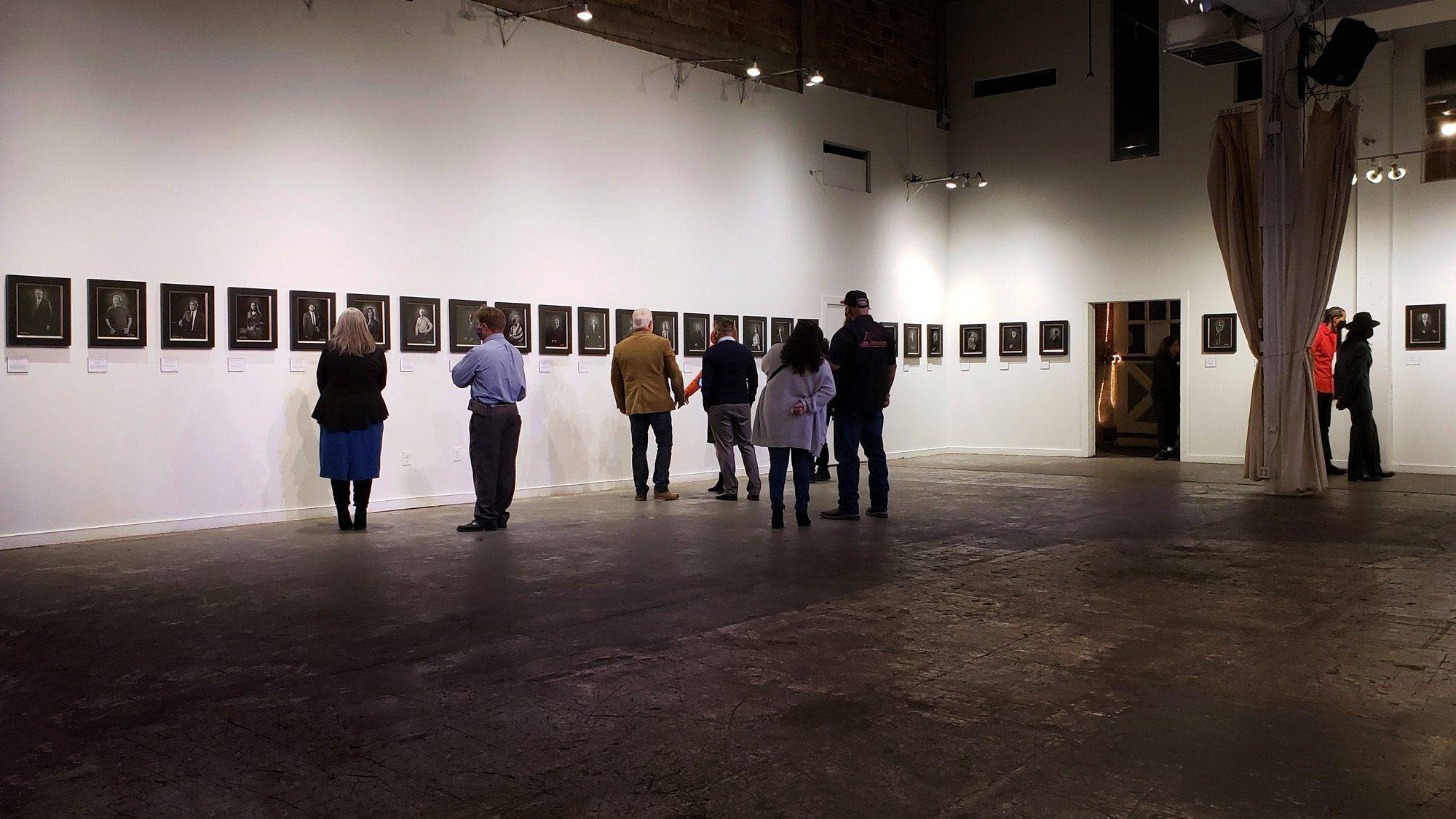 The Notable People of San Antonio in 2020 Art patrons and collectors viewing the 'Notable People of San Antonio in 2020' collection at the KGS Studios exhibition at the Brick Event Center.