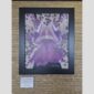 Physical documentation of Kevin G. Saunders | KGS Studios fine art prints in a public exhibition setting. Verifies the public vetting of manual hyperrealism portraits, orchid studies, and HTTX-97442. San Antonio archive proof of physical reality.