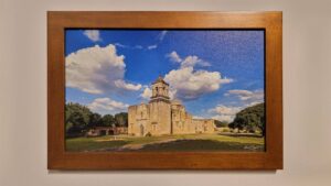 A framed, museum-quality print of Mission San José by Kevin G. Saunders, part of the World Heritage Collection.