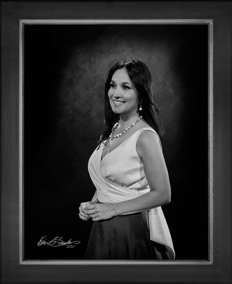 Manual hyperrealism portrait of Dr. Erika Gonzalez, CEO and President of STAAMP Allergy, captured in-person at 107 Blue Star by Kevin G. Saunders.