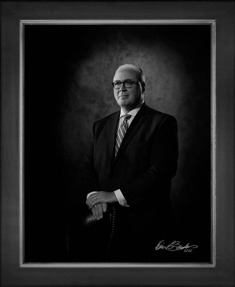 Manual hyperrealism portrait of Eddie Aldrete, Senior Vice President of IBC Bank, captured in-person at 107 Blue Star by Kevin G. Saunders.